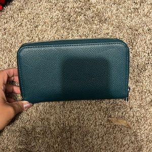 Thirty-one All about the Benjamins wallet.